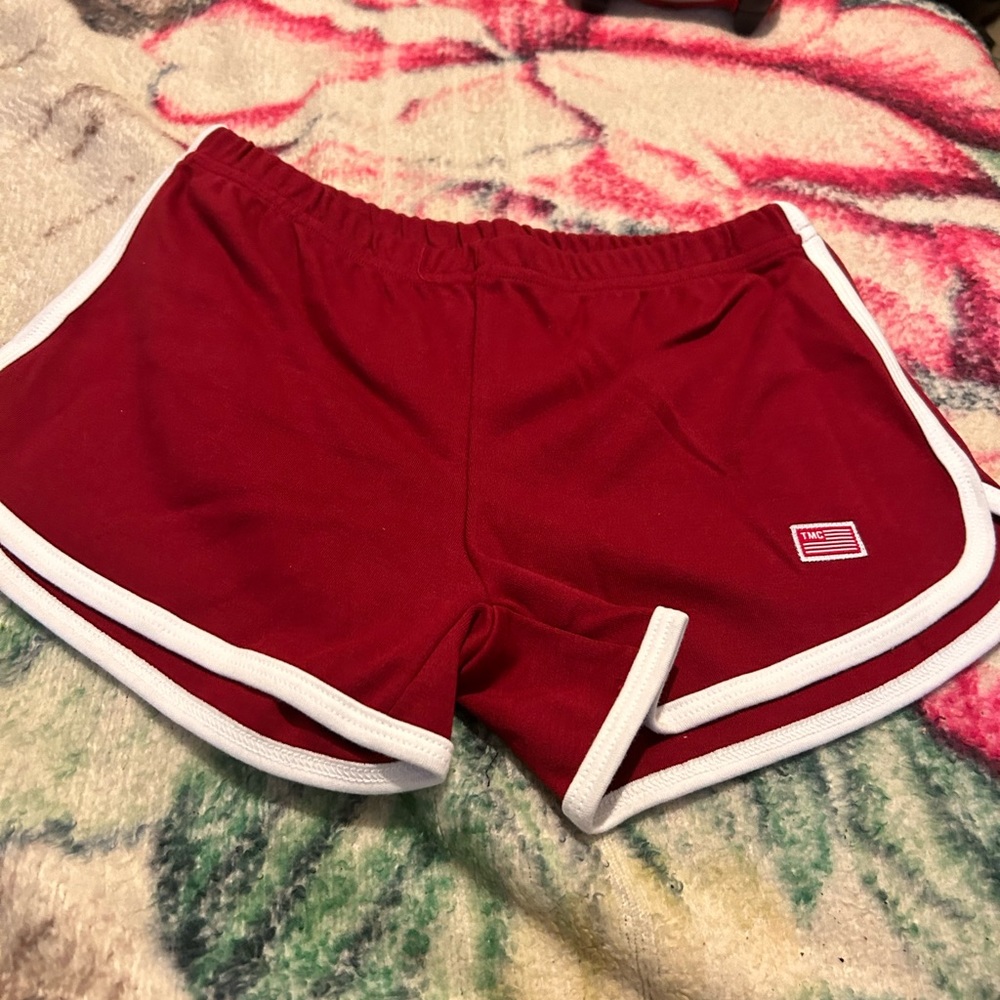 TMC - Nipsey Hussle woman’s size Small Track shorts red with white outlining